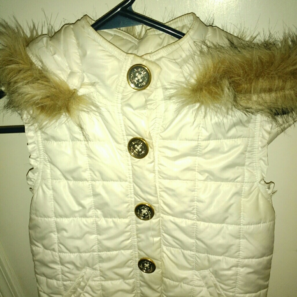White and gold vest